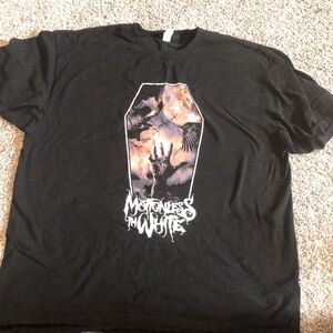 Black Motionless in White T-Shirt